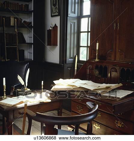 Old-fashioned bureau and desk complete with quill pens. View Large Photo Image Stock Photo - Old-fashioned bureau and desk complete with quill pens.. Fotosearch