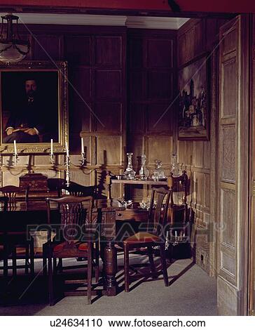 Panelled Georgian dining room with antique table and chairs View Large Photo Image Stock Image - Panelled Georgian dining room with antique table and chairs. Fotosearch