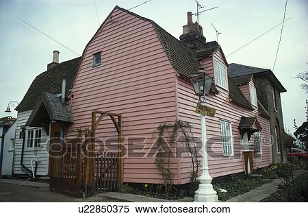 Pastel pink clapboard cottage in country village View Large Photo Image Stock Photography - Pastel pink clapboard cottage in country village. Fotosearch