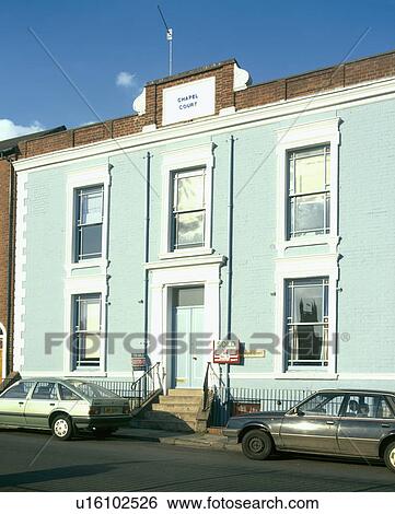 Stock Photograph - pastel turquoise double-fronted terraced townhouse . Fotosearch