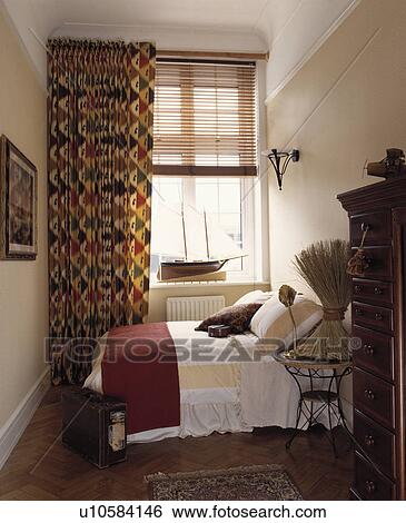 Patterned Red Green Curtains And Slatted Wooden Blind At Window In