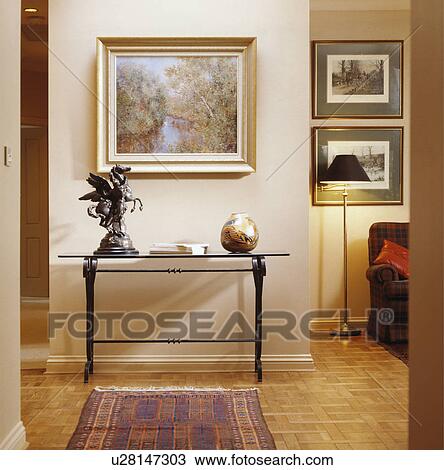 Picture above console table in openplan hall View Large Photo Image Stock Image - Picture above console table in openplan hall. Fotosearch