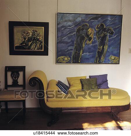 Picture - Picture above yellow chaiselongue. Fotosearch