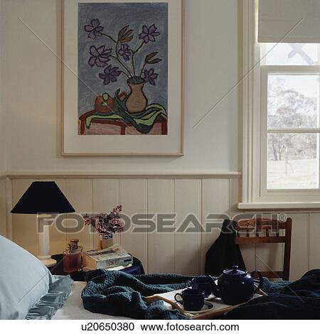 Stock Image - Picture on wall above dado panelling. Fotosearch