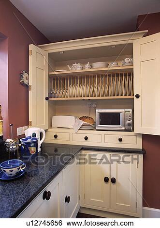 Plate Rack And Microwave In Fitted Cream Dresser In Traditional