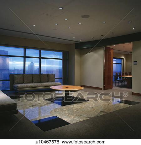 Reception area in modern offices with view of city. View Large Photo Image Stock Photo - Reception area in modern offices with view of city.. Fotosearch