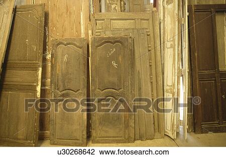 Recycling materials such as doors and windows. View Large Photo Image Stock Image - Recycling materials such as doors and windows.. Fotosearch