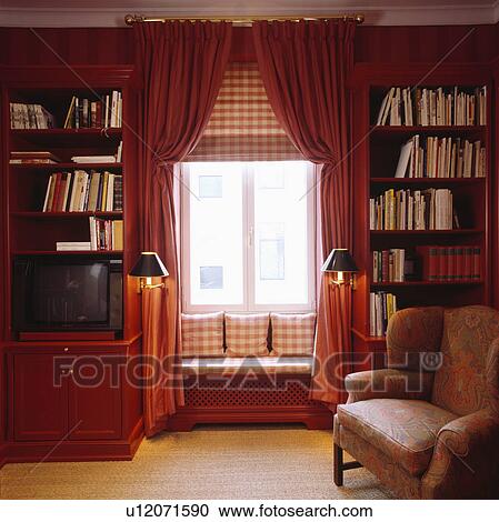 Red curtains and checked blind in red living room View Large Photo Image Stock Image - Red curtains and checked blind in red living room. Fotosearch