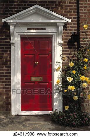 Stock Photo - Red Front Door of Zitta Cottage. Fotosearch
