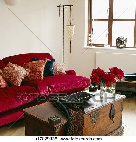 Red sofa and antique wooden chest in contemporary living room View Large Photo Image Stock Photography - Red sofa and antique wooden chest in contemporary living room. Fotosearch