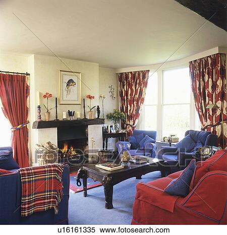 Red sofa and blue armchairs in traditional living room View Large Photo Image Stock Photography - Red sofa and blue armchairs in traditional living room. Fotosearch