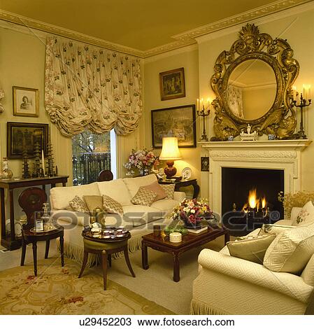 Ruched blind on window in traditional yellow town living room View Large Photo Image Stock Image - Ruched blind on window in traditional yellow town living room. Fotosearch
