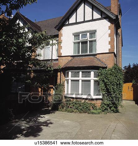 Stock Image - Semi-detached traditional Edwardian town house. Fotosearch