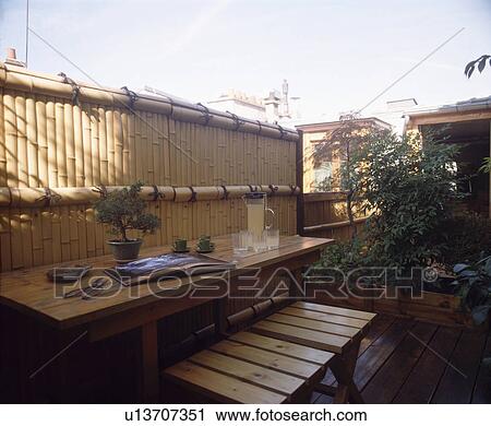 Stock Image - Small town roof garden in summer. Fotosearch