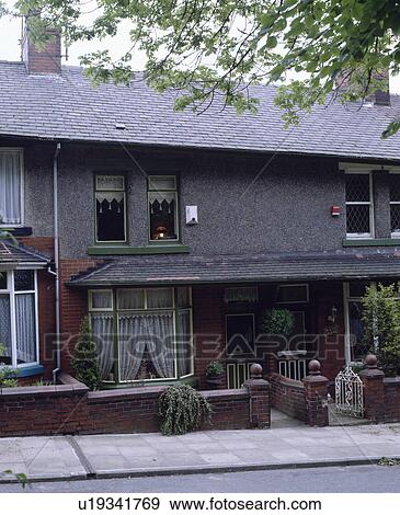 Stock Photo - Small traditional terraced Victorian house. Fotosearch