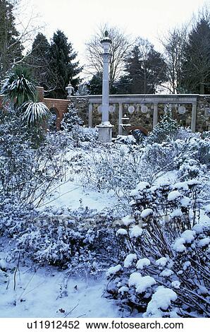 Snow in country garden in winter View Large Photo Image Stock Image - Snow in country garden in winter. Fotosearch