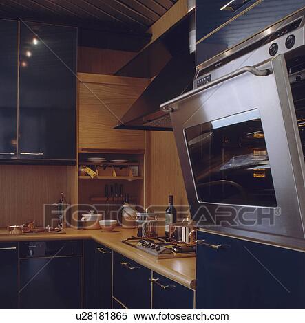Stainless steel eye-level oven in modern kitchen View Large Photo Image Stock Photography - Stainless steel eye-level oven in modern kitchen. Fotosearch