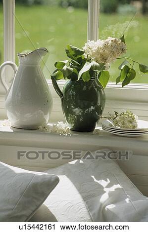 Stock Image - Still-Life of green and white jugs. Fotosearch
