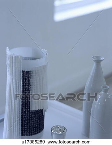 Stock Photo - Still-life of modern white ceramic vases. Fotosearch
