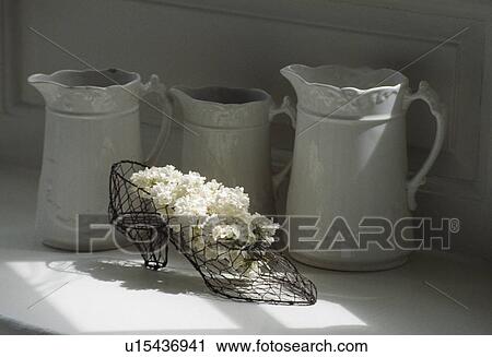 Still-Life of white lilac and jugs View Large Photo Image Stock Image - Still-Life of white lilac and jugs. Fotosearch