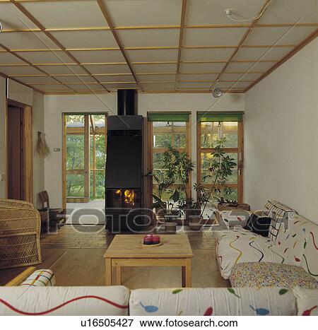 Stoves in modern white Scandinavian living room View Large Photo Image Stock Photo - Stoves in modern white Scandinavian living room. Fotosearch