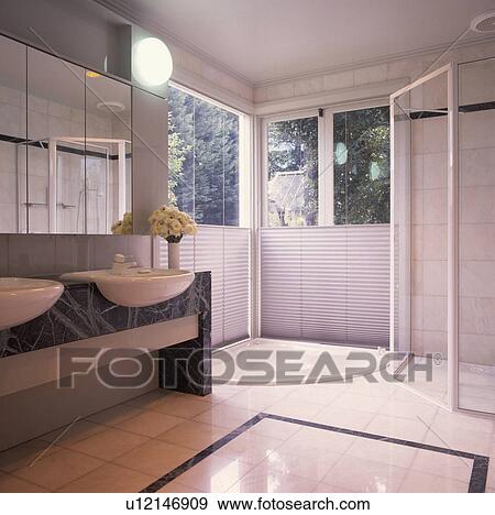 Sunken corner bath below fitted white blinds pulled halfway up large windows in modern white bathroom View Large Photo Image Stock Photo - Sunken corner bath below fitted white blinds pulled halfway up large windows in modern white bathroom. Fotosearch