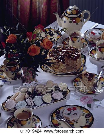 Teatable set for afternoon tea with cakes, etc. View Large Photo Image Picture - Teatable set for afternoon tea with cakes, etc.. Fotosearch