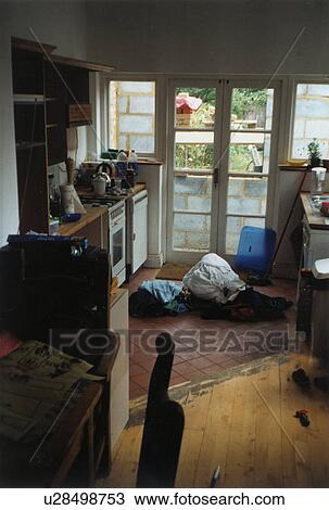 Terracotta floor tiles and wooden floor in dilapidated kitchen before renovation View Large Photo Image Stock Image - Terracotta floor tiles and wooden floor in dilapidated kitchen before renovation. Fotosearch