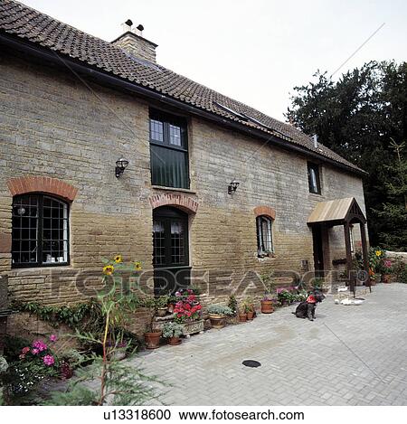 Stock Image - Traditional barn conversion. Fotosearch