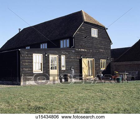 Traditional barn conversion with small extension View Large Photo Image Stock Photograph - Traditional barn conversion with small extension. Fotosearch