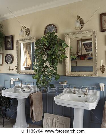 Picture - Traditional bathroom with twin sinks. Fotosearch