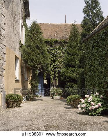 Traditional country house in France with courtyard View Large Photo Image Stock Photo - Traditional country house in France with courtyard. Fotosearch
