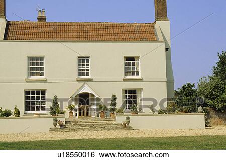 Traditional cream Georgian country house View Large Photo Image Stock Photograph - Traditional cream Georgian country house. Fotosearch