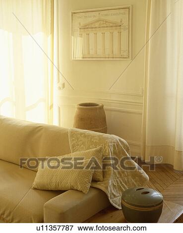 Traditional cream living room with cream sofa View Large Photo Image Stock Photo - Traditional cream living room with cream sofa. Fotosearch