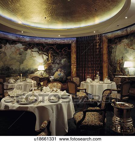 Traditional diningroom with with tapestries and round tables to echo round room and round ceiling. View Large Photo Image Stock Image - Traditional diningroom with with tapestries and round tables to echo round room and round ceiling.. Fotosearch