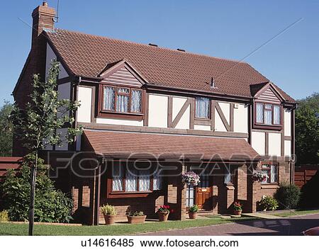 Traditional newbuild house on small estate View Large Photo Image Stock Photography - Traditional newbuild house on small estate. Fotosearch