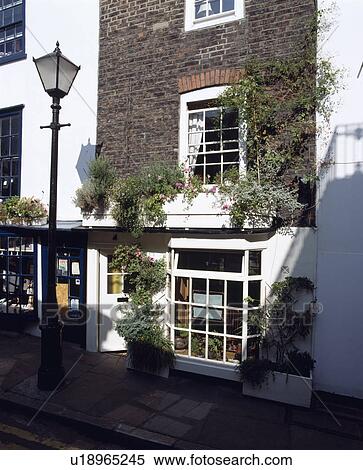Stock Photography - Traditional shop in small town. Fotosearch
