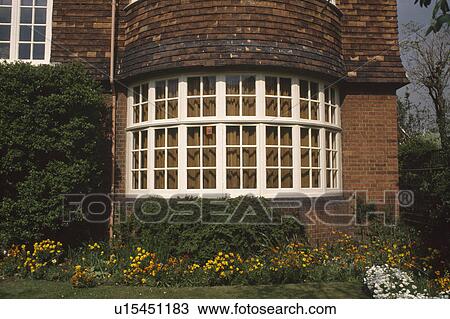 Stock Image - Traditional thirties house with bay window. Fotosearch