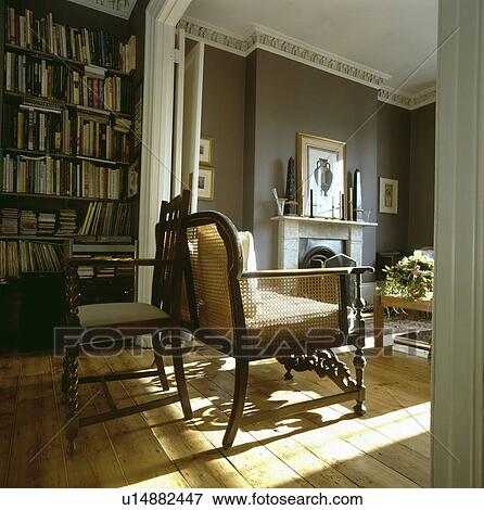 Traditional town living room with wooden flooring View Large Photo Image Stock Photo - Traditional town living room with wooden flooring. Fotosearch