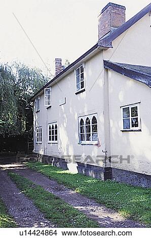 Traditional white country cottage View Large Photo Image Picture - Traditional white country cottage. Fotosearch