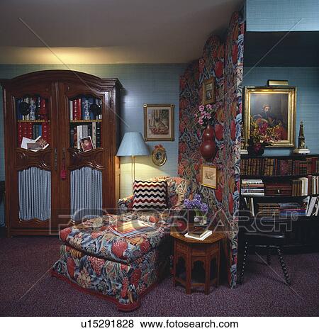 Upholstered chaiselongue in traditional living room View Large Photo Image Stock Photo - Upholstered chaiselongue in traditional living room. Fotosearch