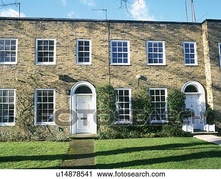 Victorian style terraced row of newbuild townhouses View Large Photo Image Stock Image - Victorian style terraced row of newbuild townhouses. Fotosearch