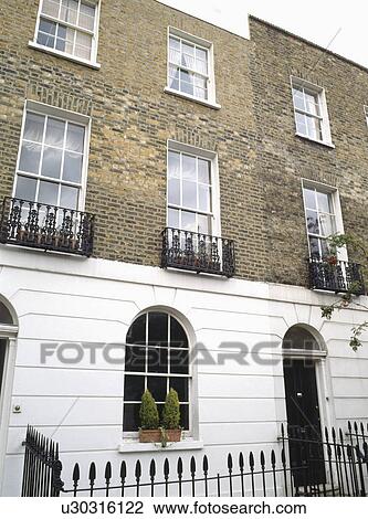 Stock Image - Victorian terraced house in North London. Fotosearch