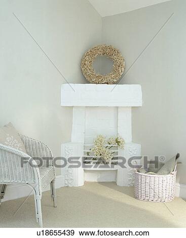 Stock Photo - White painted firegrate and mantle with shell mirror.. Fotosearch
