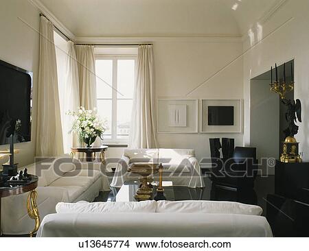 Picture - White sofas in modern white apartment living room. Fotosearch