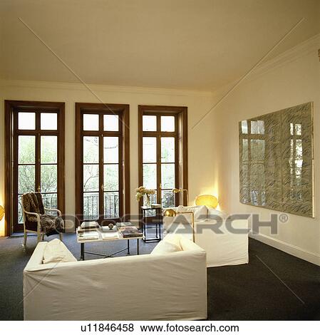 Stock Photo - White sofas in modern white living room. Fotosearch