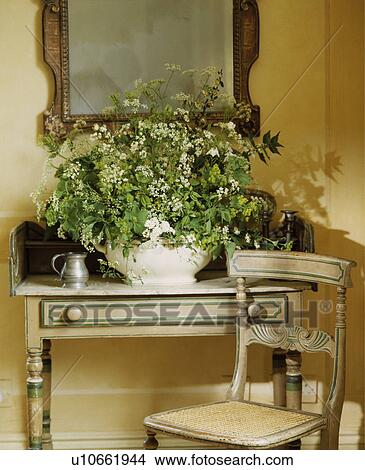 Picture - Wild flower arrangement on antique table. Fotosearch