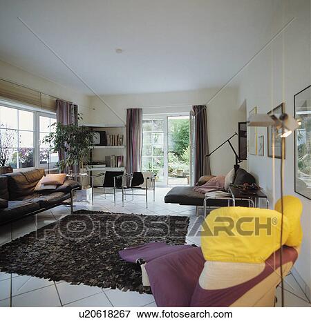 Stock Photo - Wink chair in modern living room. Fotosearch