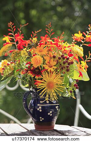 Picture - yellow, flowers, still-life, containers. Fotosearch