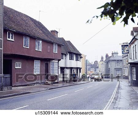 A row of traditional terraced houses on the street in a small Suffolk town View Large Photo Image Picture - A row of traditional terraced houses on the street in a small Suffolk town. Fotosearch